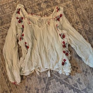 THE GREAT. Cream Blouse with Red Floral Details